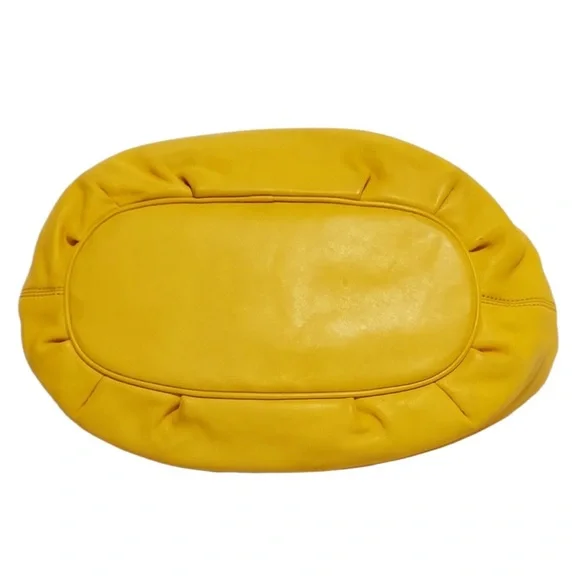 Michael Kors Astor Large Grommet Tassel Leather Hobo Shoulder Bag Yellow NWOT - Picture 7 of 12